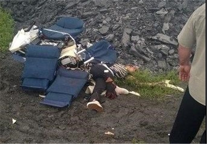 عکس/ جسد یکی از مسافران هواپیمای مالزی