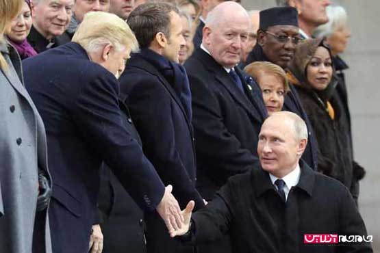 زبان اشاره میان پوتین و ترامپ (عکس)