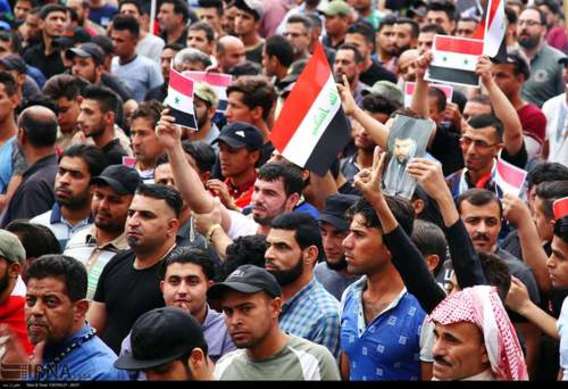 تظاهرات مردم عراق در محکومیت حمله آمریکا به سوریه (عکس)
