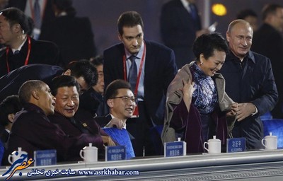 خودمانی‌ شدن پوتین و همسر رییس جمهور چین (عکس)